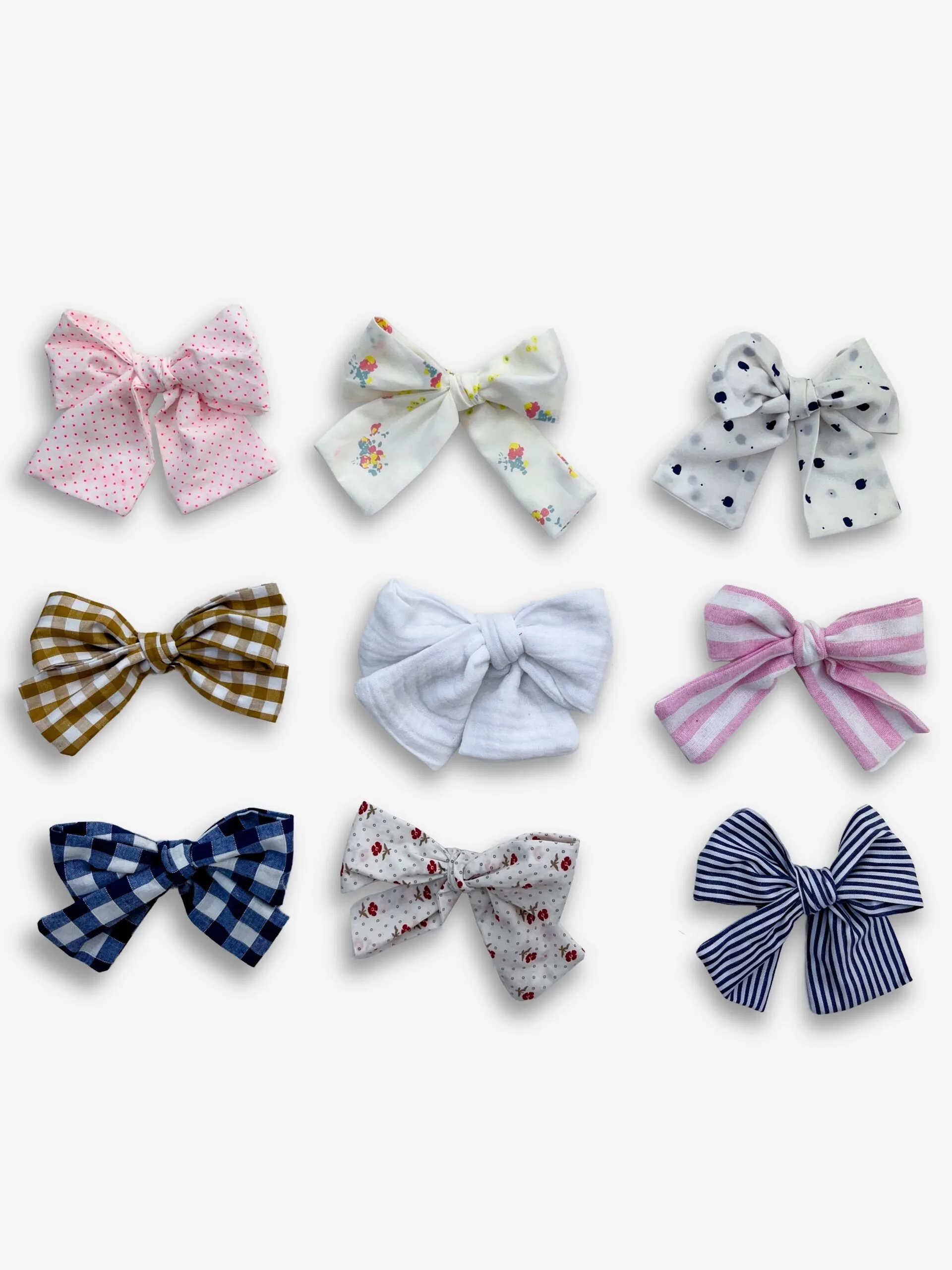 barrette gros noeud à pois rose fluo